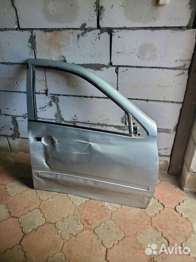 Дверь передняя правая на калину серебристый 2шт