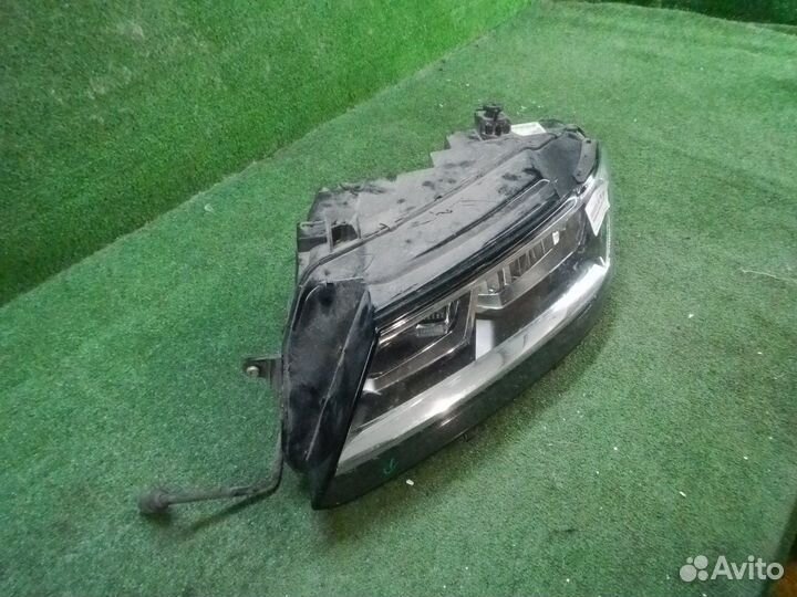 Фара левая Volkswagen Tiguan