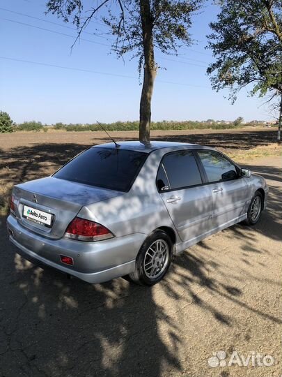 Mitsubishi Lancer 1.6 МТ, 2006, 255 000 км