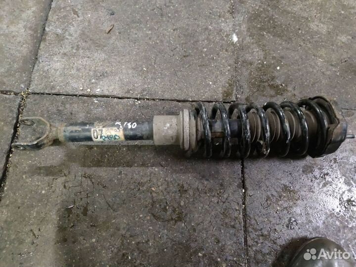 Стойка амортизатора передняя Mercedes-Benz C219