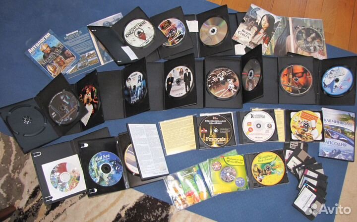 Диски DVD / CD с фильмами, играми и программами