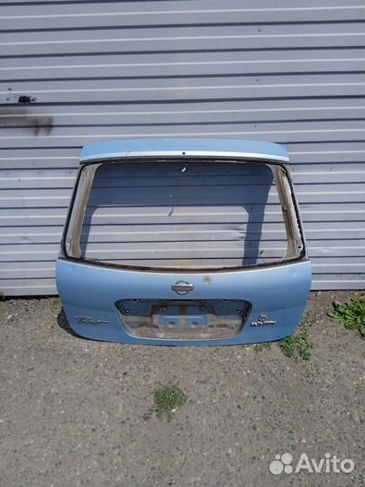 Дверь багажника Nissan Tino
