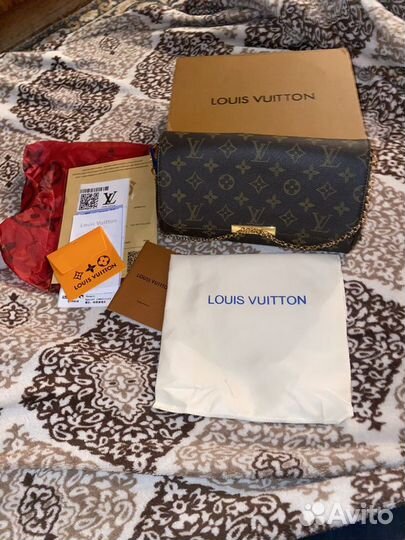 Сумка-клатч женская Louis Vuitton