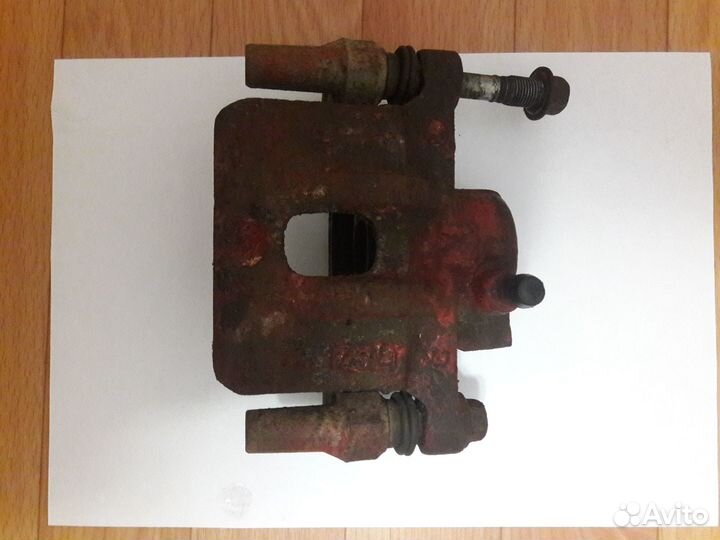 Суппорт тормозной Mitsubishi Outlander 1