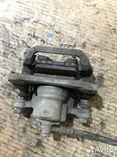 Суппорт задний левый Nissan X-Trail T31 QR25DE