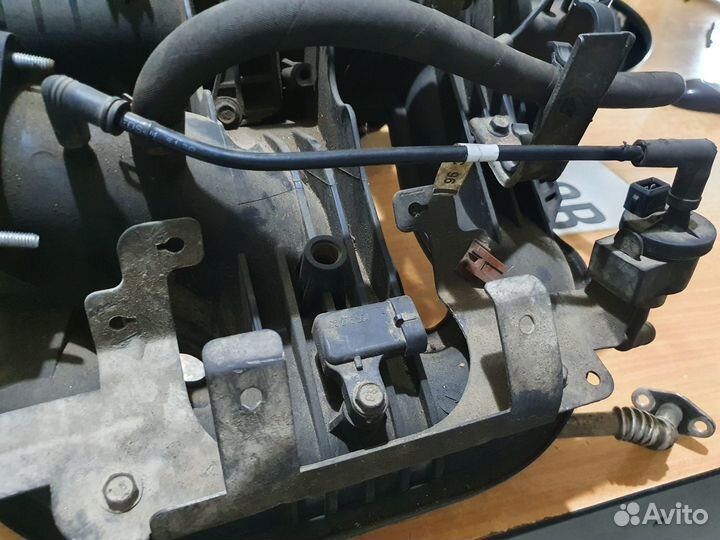 Впускной коллектор 2,0 шевроле эпика 2008 год