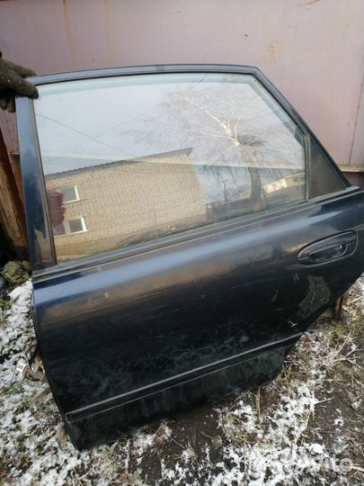 Двери мазда 626GE 1995 года