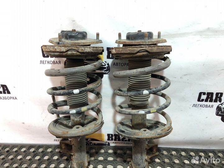 Стойки амортизаторов передние (комплект)