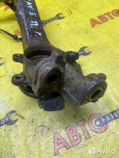 Поворотный кулак передний левый Volkswagen Passat