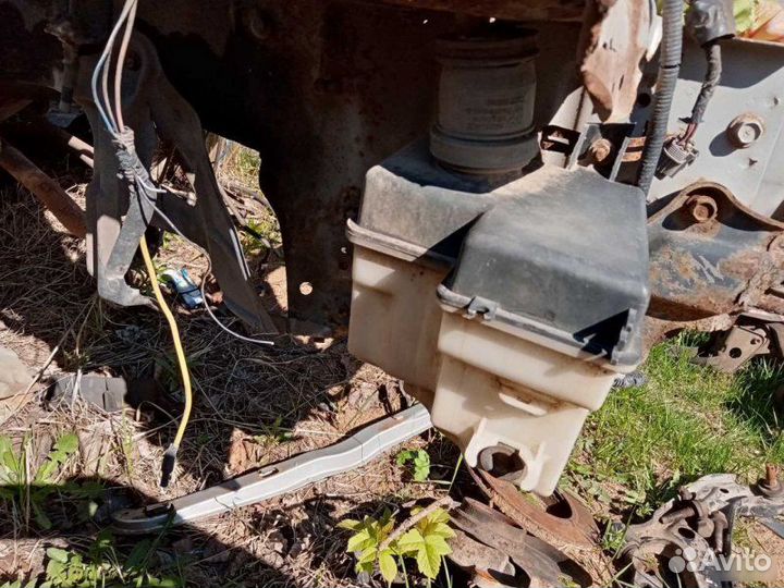 Бачок омывателя Nissan Primera Р11