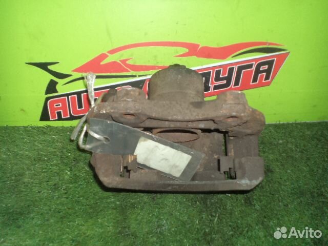 Суппорт nissan A33, QP12, RP12, TNP12, TP12, WRP12