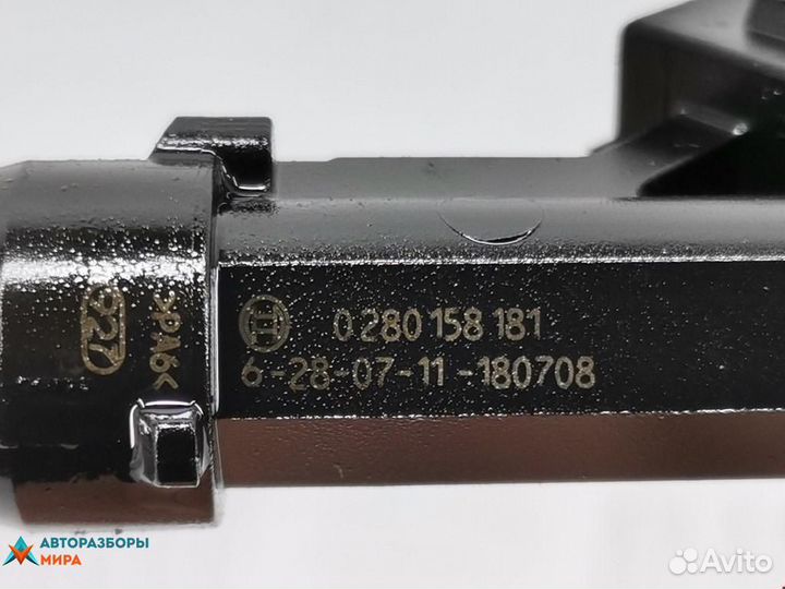 Форсунка Opel Corsa D рест. 2011 24420543