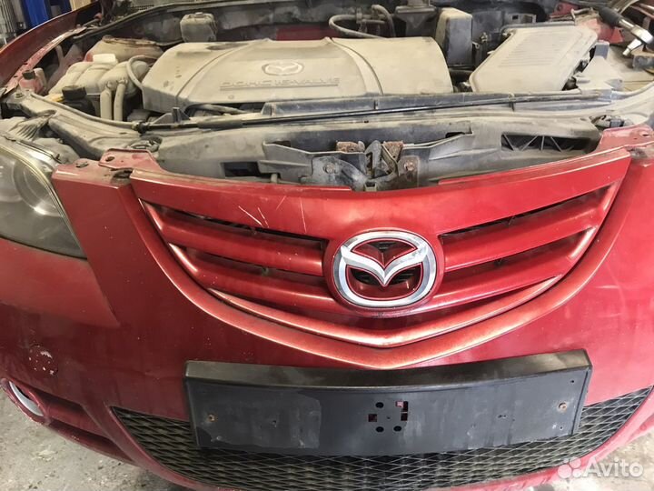Передний бампер mazda 3 bk sport седан