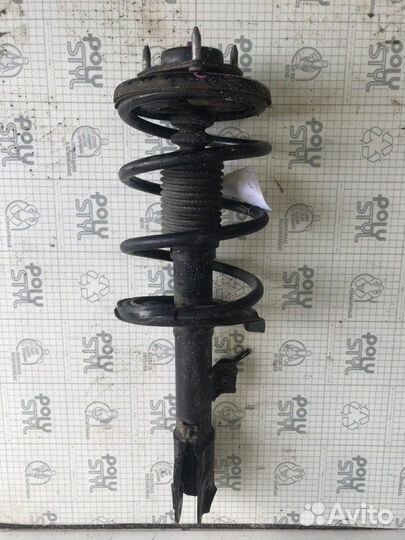 Амортизатор передний левый Mitsubishi Outlander Xl