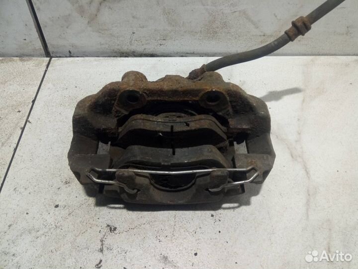 Суппорт тормозной передний правый Opel Vectra B