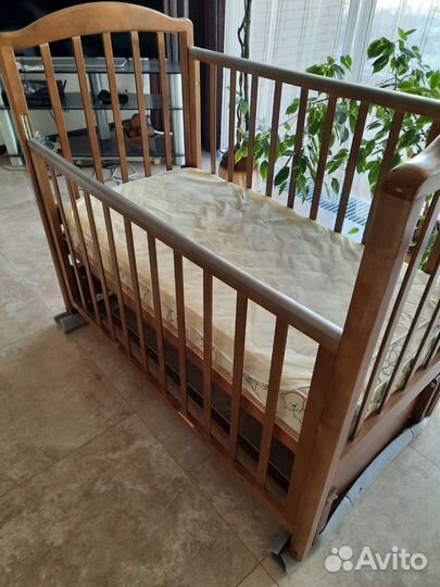 Детская кроватка с продольным маятником Можга