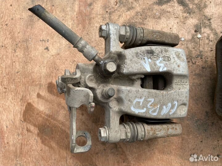 Суппорт тормозной задний Kia Ceed 2 JD