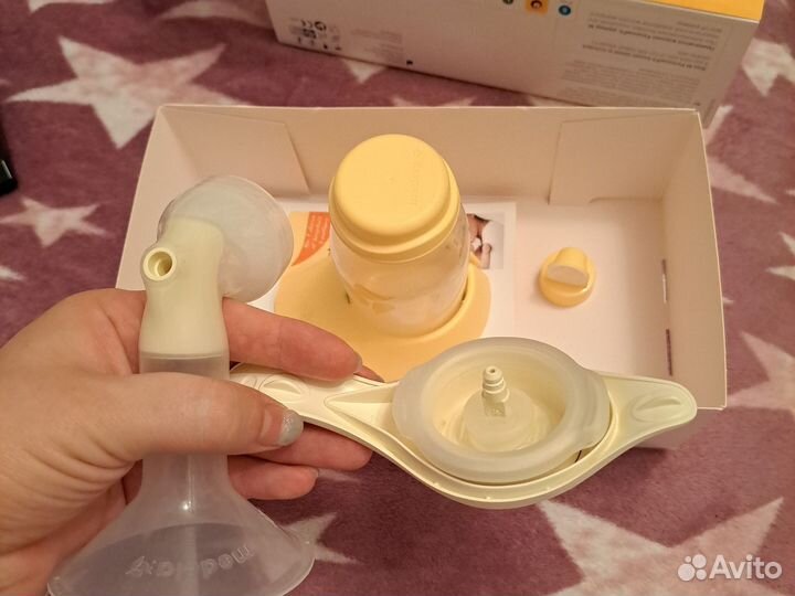 Молокоотсос medela ручной