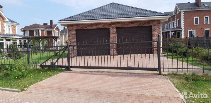 Откатные ворота и заборы под ключ