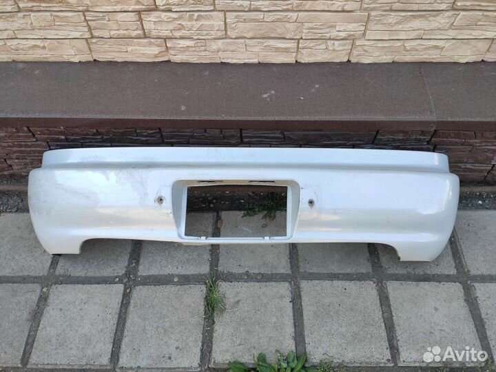 Бампер Toyota Carina ED ST202