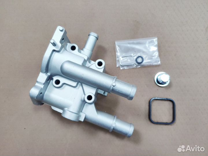 Kорпус термостата Opel Astra