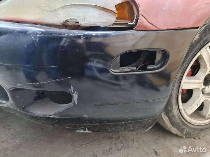 Передний бампер Mitsubishi Eclipse 2G дорест