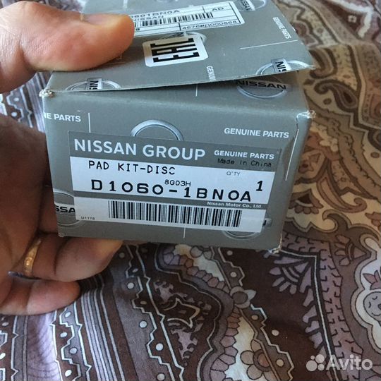 D1060-1BN0A Оригинальные колодки передние nissan