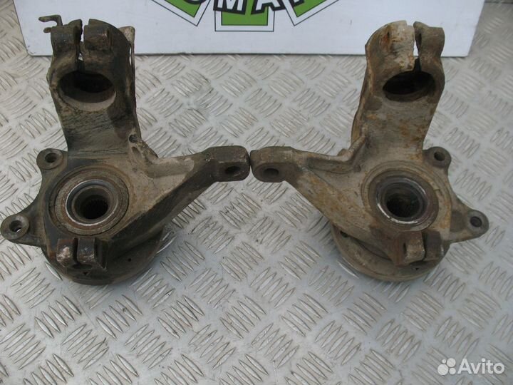 Кулак поворотный левый Peugeot Partner M49 1.4