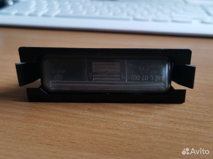 Фонарь задний освещения номера kia rio 3