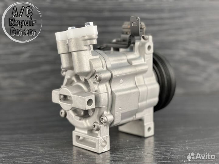Компрессор кондиционера Subaru Impreza