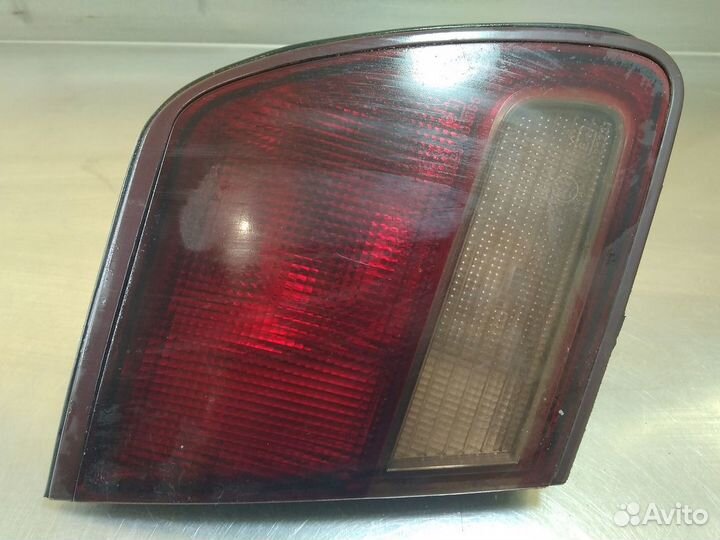 Фонарь задний внутренний левый Mitsubishi Galant 1