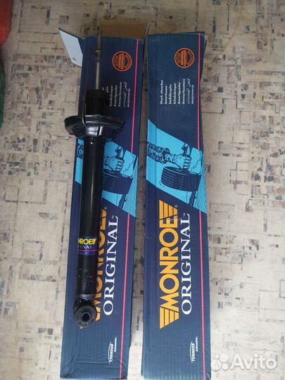 Стойка амортизатора задняя Ford Fiesta 95-01