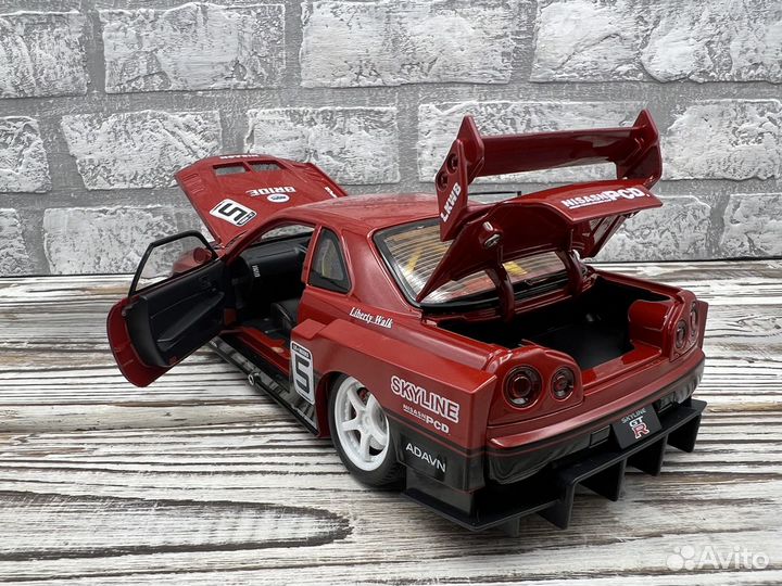 Модель автомобиля Nissan Skyline GT-R R34Ibwk 1:24