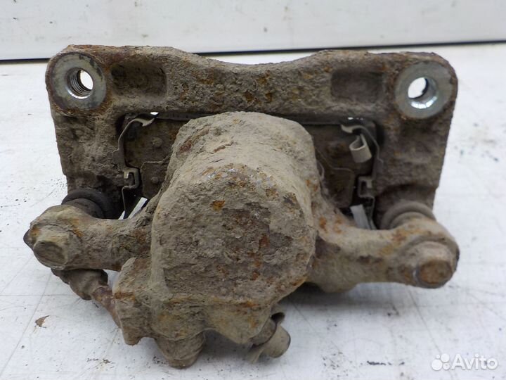 Суппорт тормозной задний левый Chevrolet Captiva