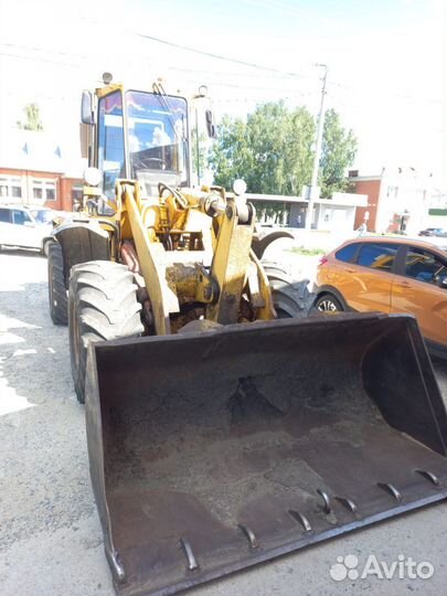 Аренда фронтального погрузчика услуги трактора