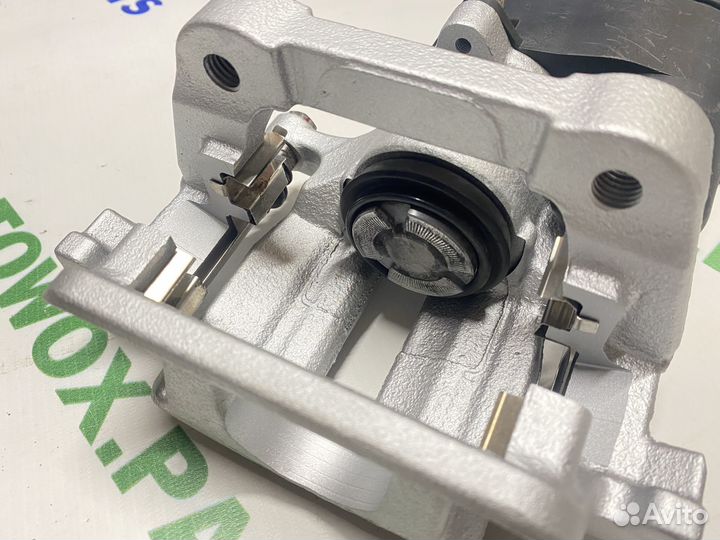 Суппорт тормозной левый электро ручник Volvo S80