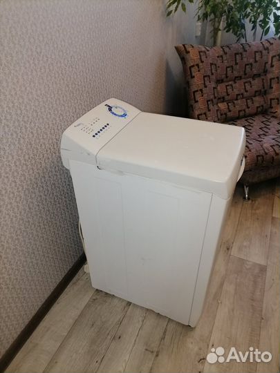 Стиральная машина с вертикальной загрузкой