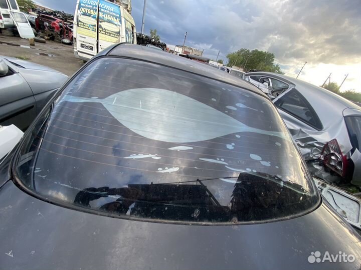 Заднее стекло Kia Spectra