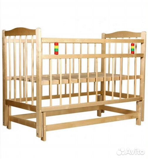 Детская кроватка с маятником