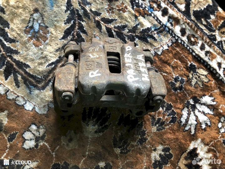 Суппорт на mitsubishi pajero junior H57A 4A31