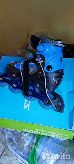 Роликовые коньки