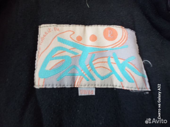 Продам зимний пуховик на девочку 128