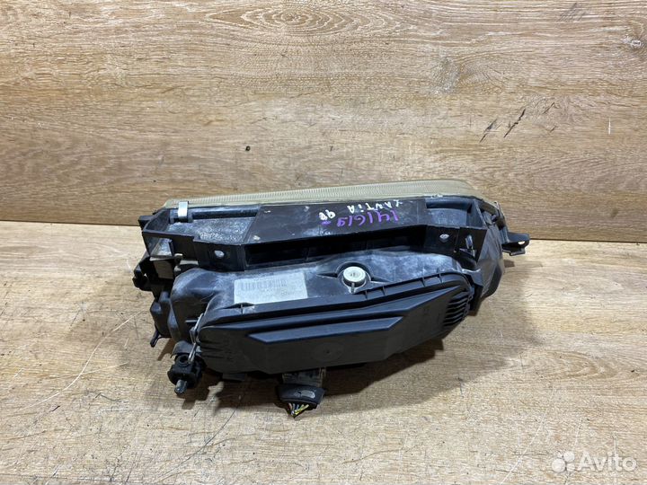 Фара левая Citroen Xantia рест 141619