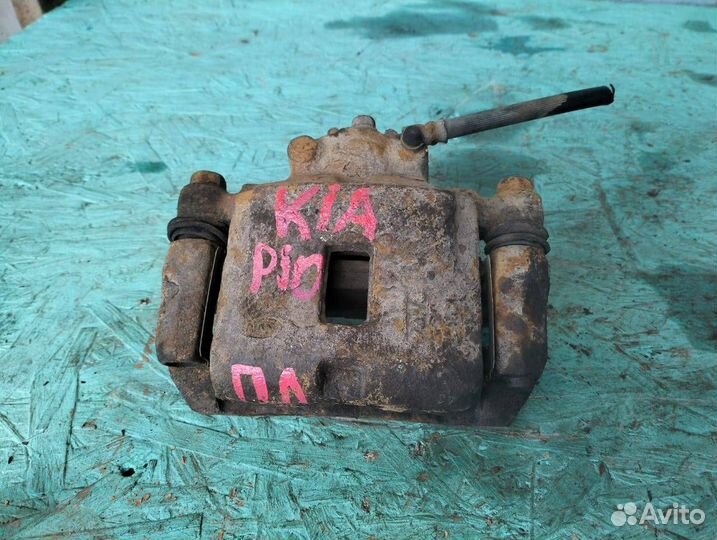 Суппорт передний левый KiaRio 1 рестайлинг