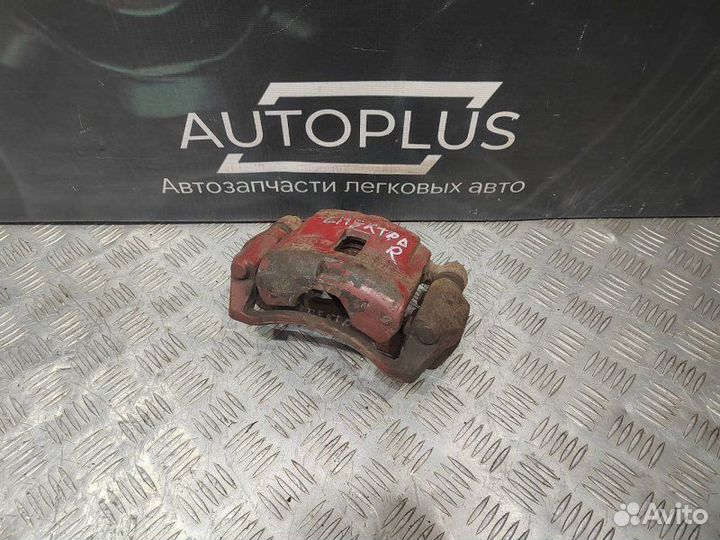 Суппорт тормозной передний правый Kia Spectra