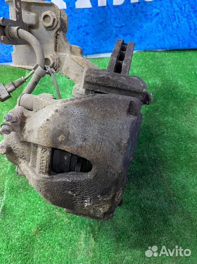 Суппорт тормозной передний левый Opel Astra H