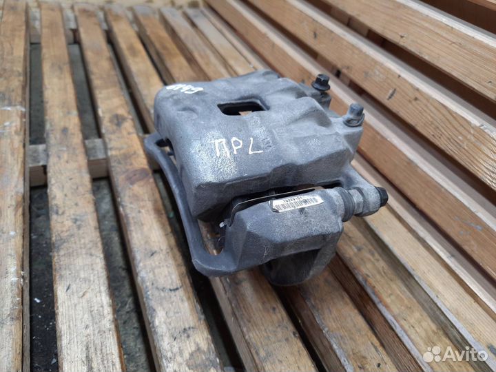 Суппорт тормозной передний левый Opel Astra J 2012