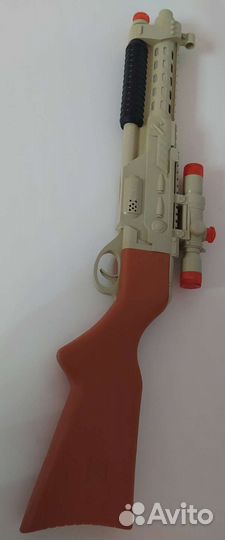 Детская игрушка автомат