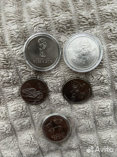 Монета Сочи разные