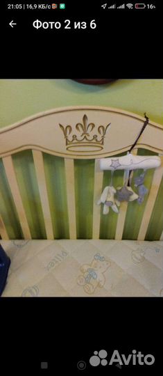 Детская кроватка с маятником и ящиком
